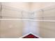 Walk-in closet features include hardwood floors and wire shelving at 10641 Firebrick Ct, Trinity, FL 34655