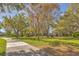 Enjoy lush greenery and recreational space in this beautiful community park with playgrounds and walking paths at 10641 Firebrick Ct, Trinity, FL 34655
