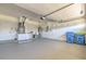 The spacious garage has ample room for parking and storage, with included wash sink and utility connections at 10641 Firebrick Ct, Trinity, FL 34655