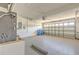 The garage has ample space for multiple vehicles, featuring an automatic door, and wash sink at 10641 Firebrick Ct, Trinity, FL 34655
