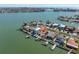 Aerial view of waterfront property with a private pool and dock access, located in a desirable neighborhood at 11125 7Th E St, Treasure Island, FL 33706
