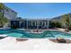 Sparkling pool with a pergola-covered patio perfect for outdoor entertaining at 11125 7Th E St, Treasure Island, FL 33706