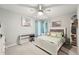 Bright bedroom featuring neutral walls, ample natural light and a comfortable bed at 13553 Landers Dr, Hudson, FL 34667