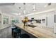 Bright open kitchen featuring granite countertops, stainless steel appliances, and a spacious breakfast bar at 13553 Landers Dr, Hudson, FL 34667
