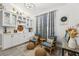 Cozy living room featuring built-in cabinets, stylish seating, and decorative accents that create an inviting atmosphere at 13553 Landers Dr, Hudson, FL 34667