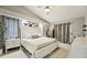 Main bedroom with ceiling fan, and neutral color palette at 13553 Landers Dr, Hudson, FL 34667