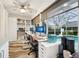 Office setup with built-in storage and pool views at 13553 Landers Dr, Hudson, FL 34667