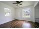 Bedroom with hardwood floors, natural light, and neutral walls at 1807 23Rd N Ave, St Petersburg, FL 33713