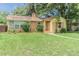 Charming single-story home with a well-manicured lawn and inviting curb appeal at 1807 23Rd N Ave, St Petersburg, FL 33713