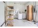 Functional laundry room with modern appliances, storage, and utility connections at 1807 23Rd N Ave, St Petersburg, FL 33713
