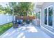 Cozy backyard patio with stylish outdoor seating, ideal for enjoying the serene outdoor ambiance at 2096 Church Creek Pt, Largo, FL 33774