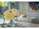 Close-up of kitchen counter with flower arrangement and stylish decor creates a warm and inviting atmosphere at 2096 Church Creek Pt, Largo, FL 33774