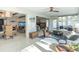 Spacious living area with dining space, comfortable seating, and abundant natural light throughout the home at 2096 Church Creek Pt, Largo, FL 33774