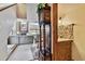 Inviting foyer with staircase, tiled floors, and a view of the living room with a fireplace at 2199 Springrain Dr, Clearwater, FL 33763