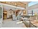 Open-concept living room with two story ceilings and hardwood floors at 2199 Springrain Dr, Clearwater, FL 33763