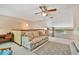 Upstairs loft with comfortable sofa and a view to a lower level at 2199 Springrain Dr, Clearwater, FL 33763