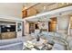 Spacious living room with an entertainment center and stairs leading to a second floor at 2199 Springrain Dr, Clearwater, FL 33763