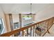 Bright living room with a vaulted ceiling and large window framing a view of the lake at 2199 Springrain Dr, Clearwater, FL 33763