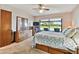 Spacious main bedroom includes ceiling fan and lots of storage at 2199 Springrain Dr, Clearwater, FL 33763