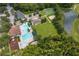 Aerial view featuring community pool, playground, basketball court, sand volleyball court, and other amenities at 25323 Lexington Oaks Blvd, Wesley Chapel, FL 33544