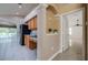 View from dining space to kitchen and casual living area at 25323 Lexington Oaks Blvd, Wesley Chapel, FL 33544