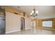 Spacious open-concept living area with tile flooring and neutral paint at 25323 Lexington Oaks Blvd, Wesley Chapel, FL 33544