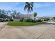 Well-maintained home featuring manicured lawn and mature landscaping at 2572 Forest Run Ct, Clearwater, FL 33761