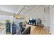 Bright living room featuring wood floors, high ceilings, modern furniture, and ample natural light at 2572 Forest Run Ct, Clearwater, FL 33761