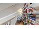 Charming reading nook features a chair and wall-to-wall bookshelves at 2572 Forest Run Ct, Clearwater, FL 33761