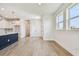Bright open-concept living space featuring natural light and wood floors at 2832 Marrakesh Ln, Sarasota, FL 34234