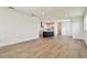 Open-concept living space features modern kitchen, hardwood flooring, and bright natural light at 2832 Marrakesh Ln, Sarasota, FL 34234