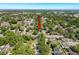Aerial view showcasing the property's location with a tranquil, tree-filled neighborhood at 3106 E 25Th Ave, Tampa, FL 33605