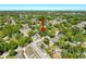 Aerial view of the property highlighting its position in a tree-lined neighborhood at 3106 E 25Th Ave, Tampa, FL 33605