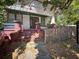 Home's charming porch featuring brick columns, vintage charm, and inviting appeal at 3106 E 25Th Ave, Tampa, FL 33605