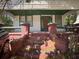 Home's entrance featuring brick columns and steps, creating a warm and inviting appeal at 3106 E 25Th Ave, Tampa, FL 33605