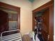 Hallway cluttered with various items needing a renovation and clean out at 3106 E 25Th Ave, Tampa, FL 33605