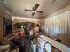 Cluttered room with boxes and miscellaneous items, indicative of a property needing renovation and clearing at 3106 E 25Th Ave, Tampa, FL 33605