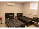 Cozy bedroom with two beds, modern decor, and natural light at 314 E Althea Ave, Tampa, FL 33612
