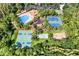 Aerial view of community sports amenities including pool and courts at 31833 Turkeyhill Dr, Wesley Chapel, FL 33543