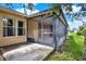Enclosed patio perfect for outdoor living and dining at 31833 Turkeyhill Dr, Wesley Chapel, FL 33543