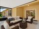 Cozy covered patio with outdoor seating and stylish decor at 31833 Turkeyhill Dr, Wesley Chapel, FL 33543