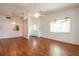 Spacious living room with wood flooring and ample natural light at 3346 Gorse Ct, Palm Harbor, FL 34684