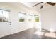 Bright sunroom with tile floors and multiple windows offering natural light at 3346 Gorse Ct, Palm Harbor, FL 34684