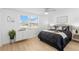 Cozy bedroom features ample natural light, modern accents, and a comfortable layout at 3352 Honeymoon Ln, Holiday, FL 34691
