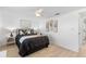Charming bedroom with neutral tones, black accents, and a calming atmosphere at 3352 Honeymoon Ln, Holiday, FL 34691