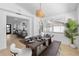 Dining room with modern finishes and view to the kitchen and entry way at 3352 Honeymoon Ln, Holiday, FL 34691