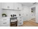 Bright office featuring custom built-ins, desk space and ample storage at 3352 Honeymoon Ln, Holiday, FL 34691