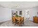 Dining room adjacent to a kitchen and a laundry area at 4407 Hill Dr, Valrico, FL 33596