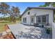 Inviting front porch with seating and decorative plants, perfect for relaxing outdoors at 4407 Hill Dr, Valrico, FL 33596