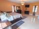 Spacious bedroom featuring tile floors, chandelier, and furniture at 4902 Five Acre Rd, Plant City, FL 33565